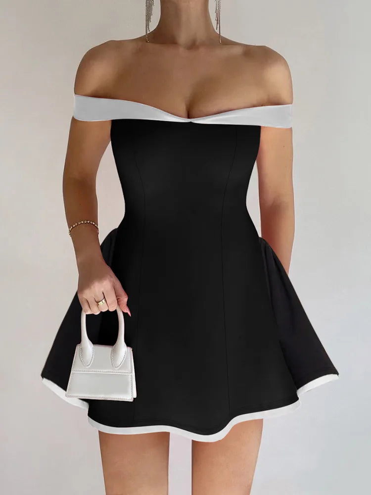 Off shoulder Ela black and white lining mini dress. GoSobiShop Boutique Off shoulder Ela black and white lining mini dress. GoSobiShop Boutique