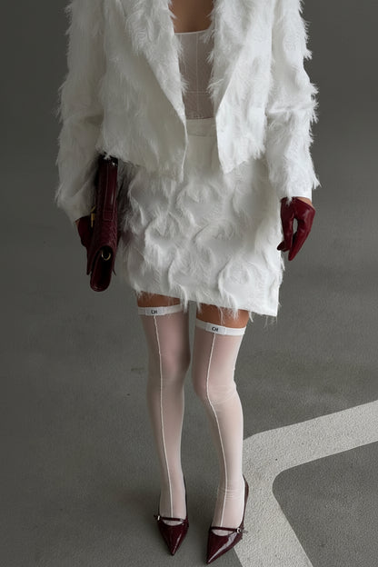 Product photo of Elara Sheer Back-Seam Thigh-High Stockings.