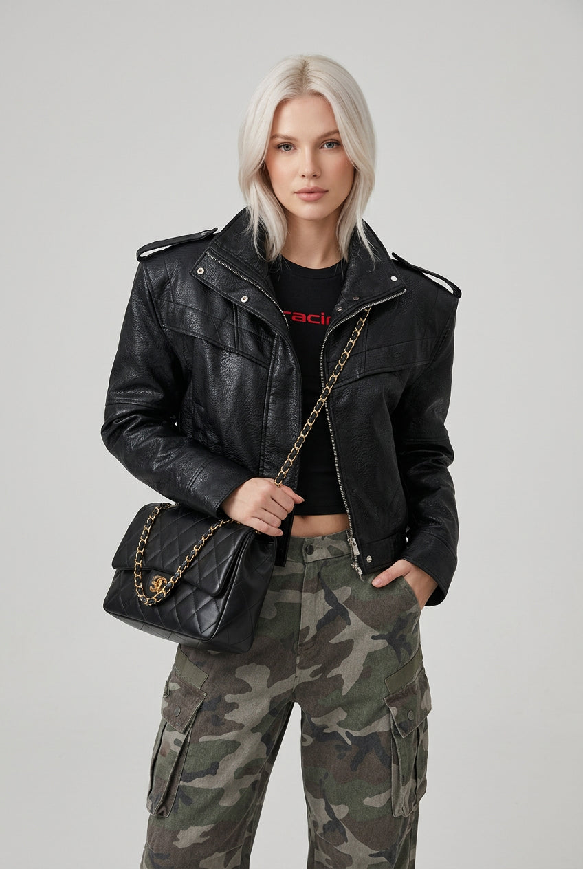 Detail view of the jacket's zipper and front panel