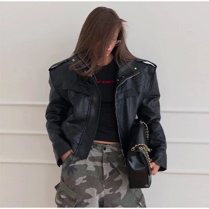 Detail view of the jacket's zipper and front panel