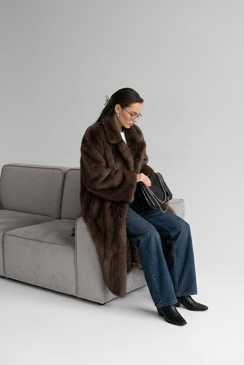 Long gradient faux fur coat with wide collar in a full front view