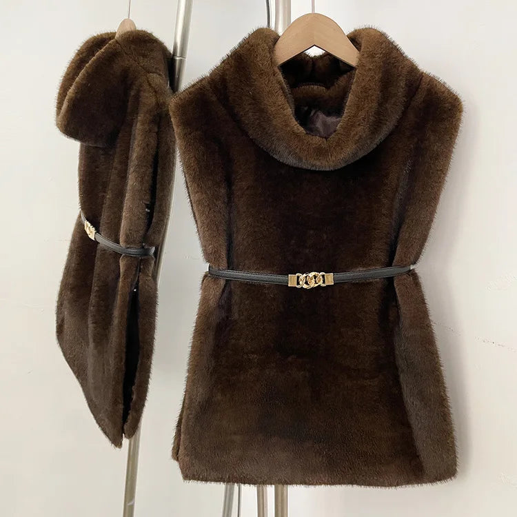 Women's faux fur vest in beige, front view

Women's plush faux fur vest with matching belt

Women's brown faux fur vest, sleeveless design

Women's faux fur vest with long front and short back

Close-up of plush faux fur vest texture

Women's faux fur vest styled with a long-sleeve top