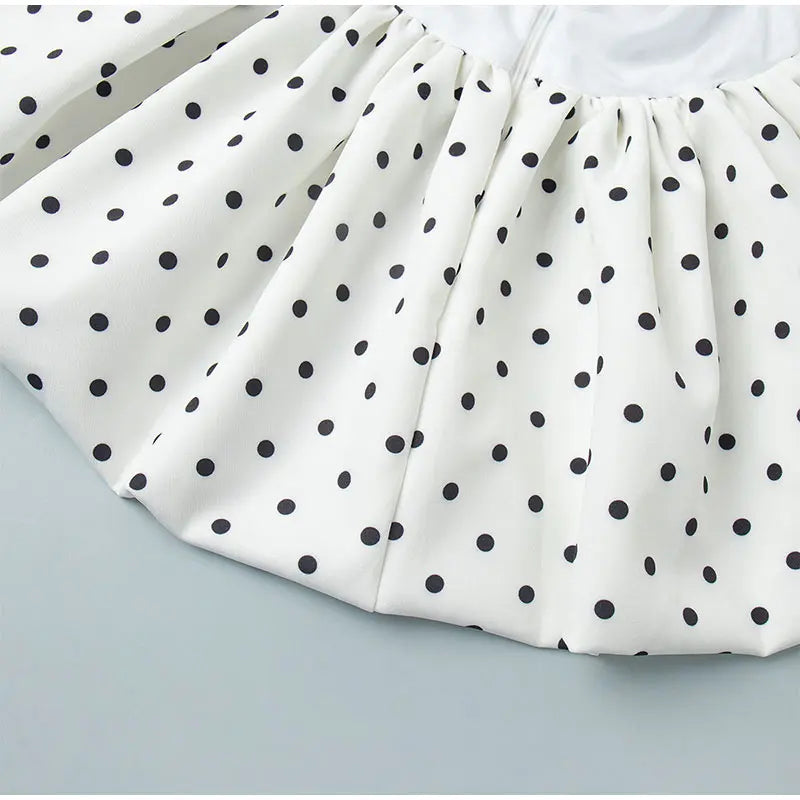 polka dot pants set, polka dot two piece set, women's polka dot set, halter pants set women, wide leg pants set, polka dot outfit women, matching pants set women, two piece outfit women, V neck halter top, lace up backless top, wide leg pants outfit, women's summer outfit, chic matching set, black and white pants set, vacation outfit women, brunch outfit women, date night outfit, women's boutique fashion