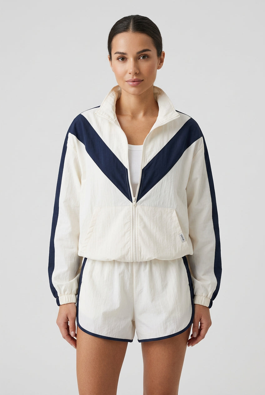 Contrast zip-up set with stand-collar jacket and coordinated shorts