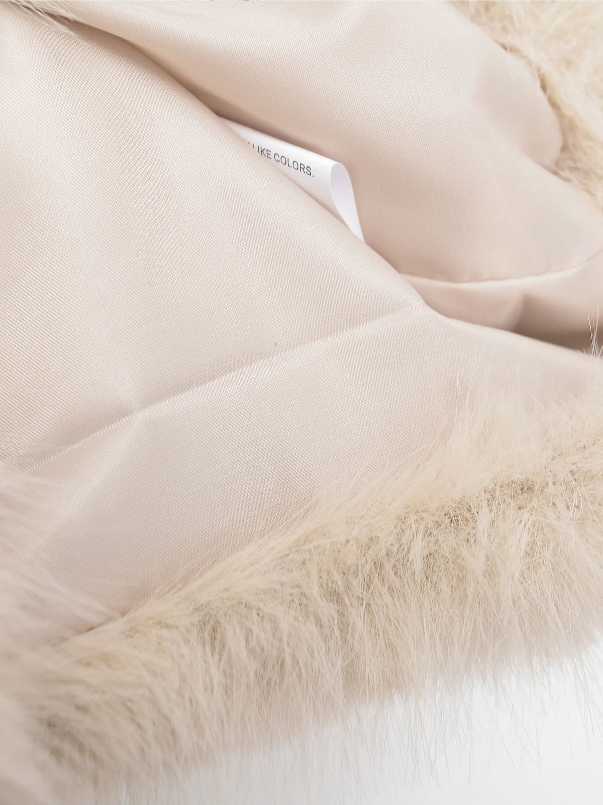 Faux fur turtleneck vest showing the front shape