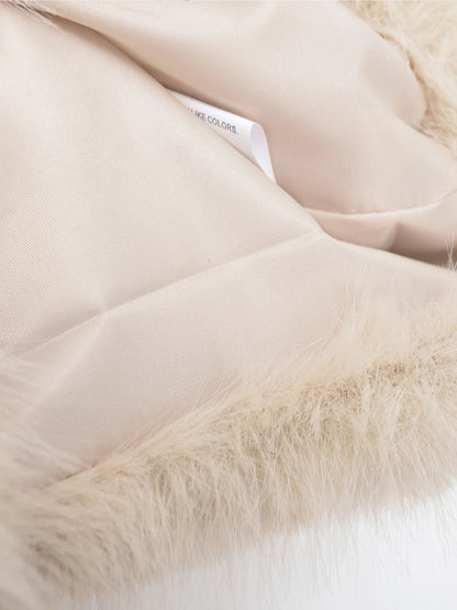 Faux fur turtleneck vest showing the front shape