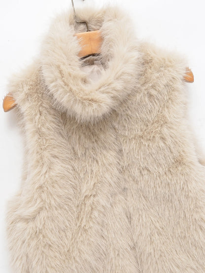Beige faux fur vest showing its sleeveless silhouette