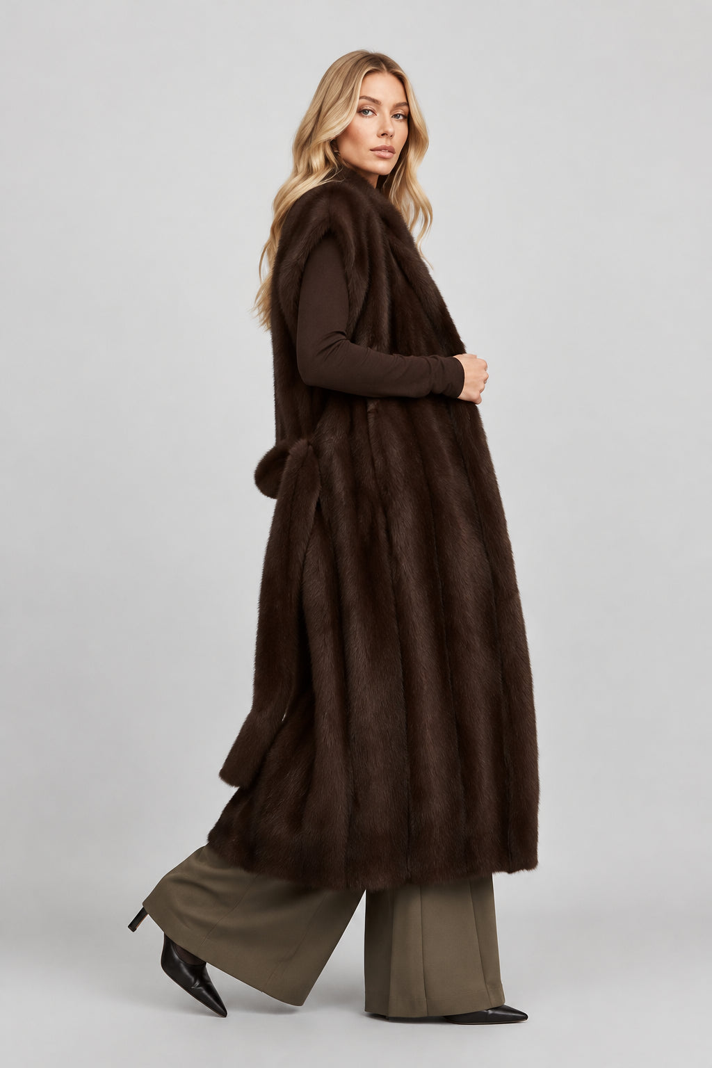 Noelle sleeveless faux fur vest with a matching waist belt