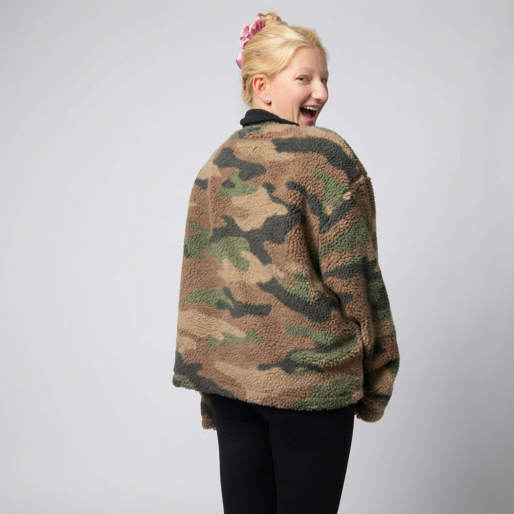 Detail of the hood and high neckline on the camo fleece jacket