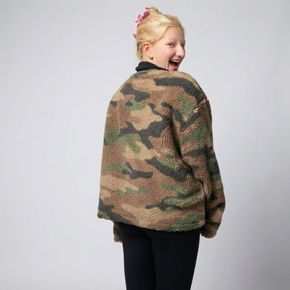 Detail of the hood and high neckline on the camo fleece jacket