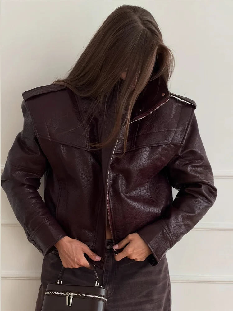 Front zipper detail on the structured cropped jacket