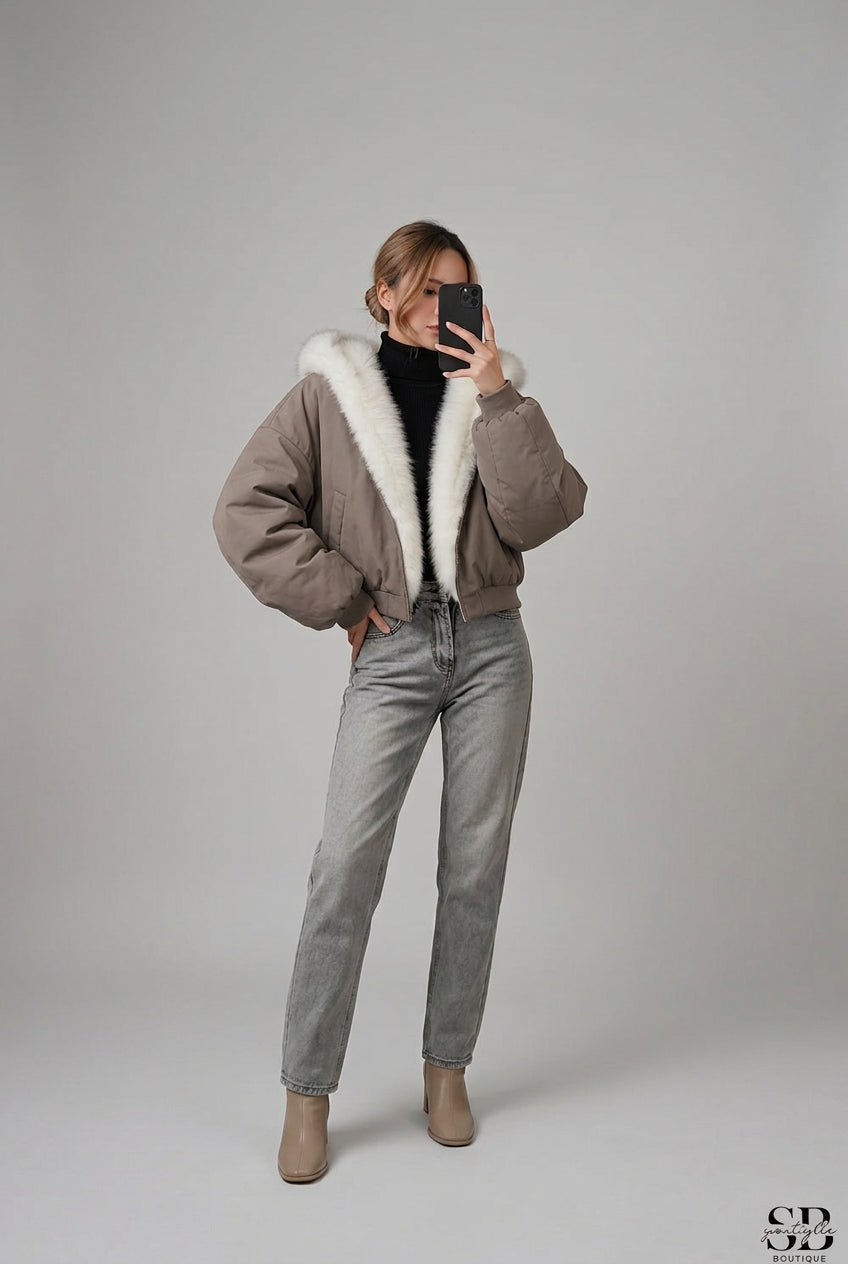 Beige reversible faux fur hooded jacket shown from the front