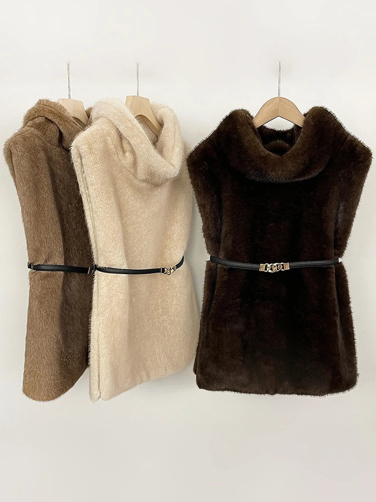 Women's faux fur vest in beige, front view

Women's plush faux fur vest with matching belt

Women's brown faux fur vest, sleeveless design

Women's faux fur vest with long front and short back

Close-up of plush faux fur vest texture

Women's faux fur vest styled with a long-sleeve top