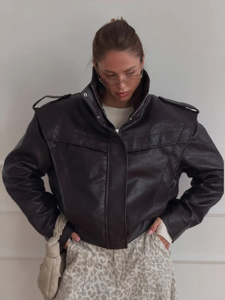 Structured cropped jacket styled as a modern outerwear look