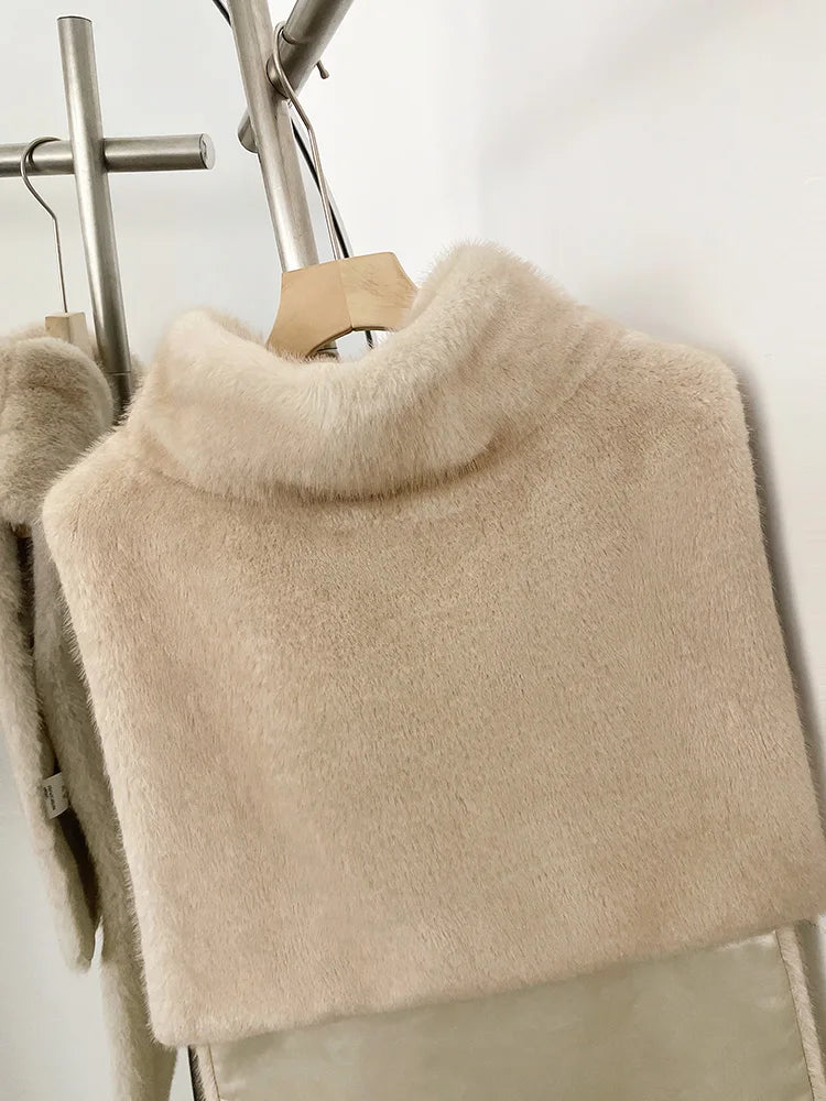 Women's faux fur vest in beige, front view

Women's plush faux fur vest with matching belt

Women's brown faux fur vest, sleeveless design

Women's faux fur vest with long front and short back

Close-up of plush faux fur vest texture

Women's faux fur vest styled with a long-sleeve top
