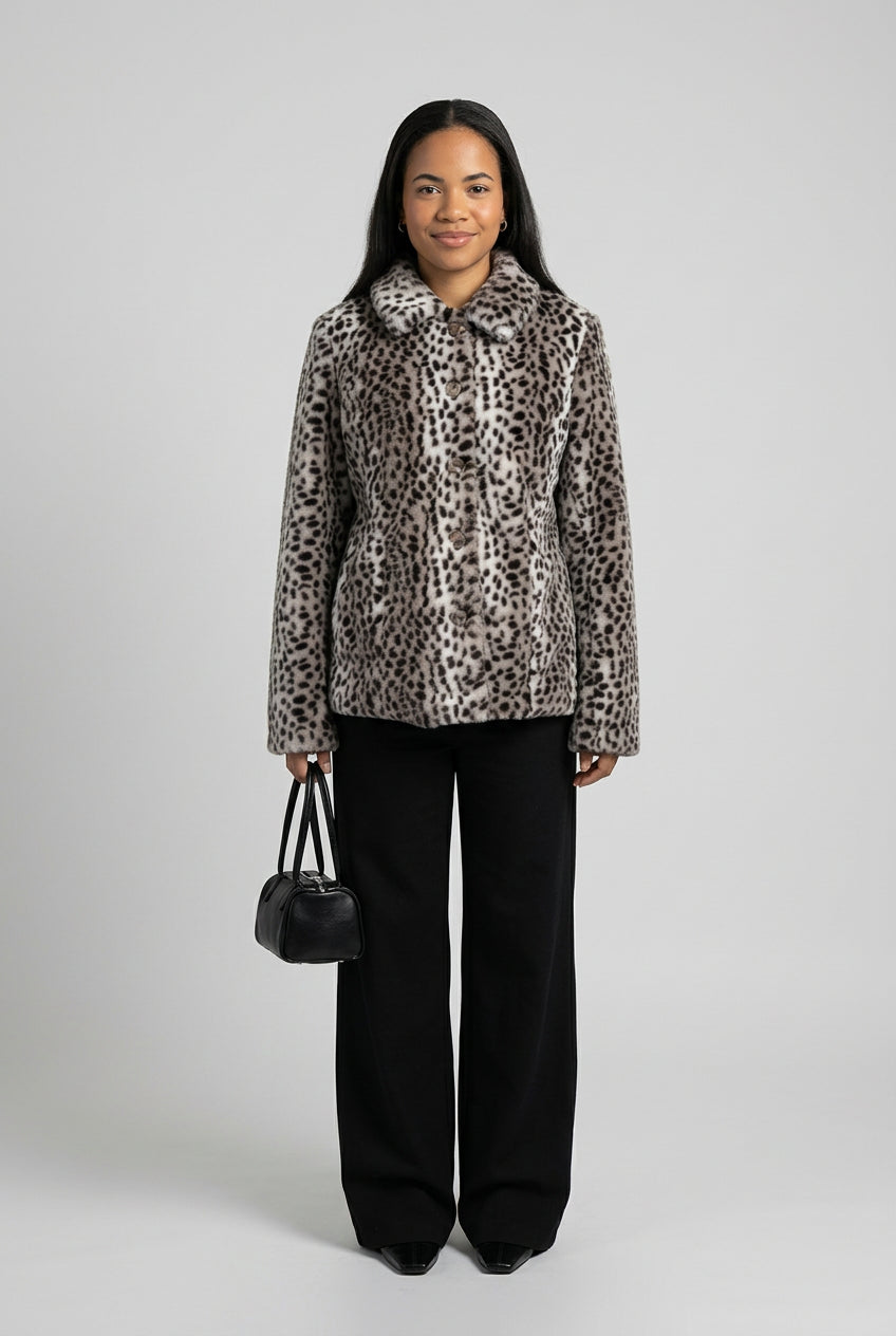 Leopard-print coat styled as a statement outerwear piece
