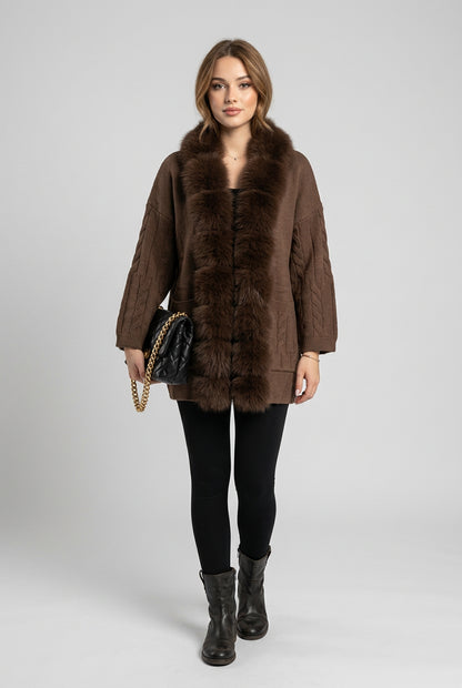 Detail of the cardigan's button front and textured knit fabric