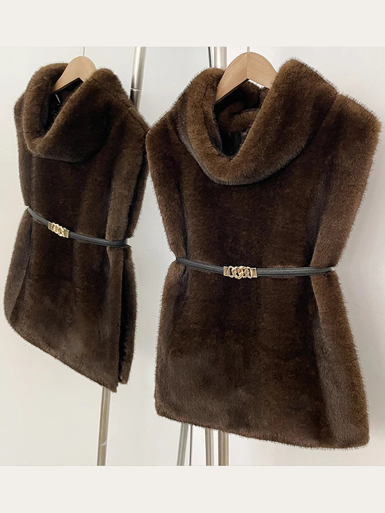 Women's faux fur vest in beige, front view

Women's plush faux fur vest with matching belt

Women's brown faux fur vest, sleeveless design

Women's faux fur vest with long front and short back

Close-up of plush faux fur vest texture

Women's faux fur vest styled with a long-sleeve top