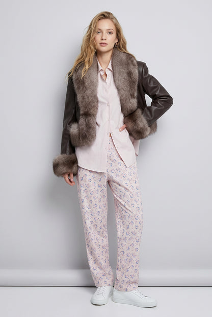 Women's short faux fur patchwork jacket showing the front zip