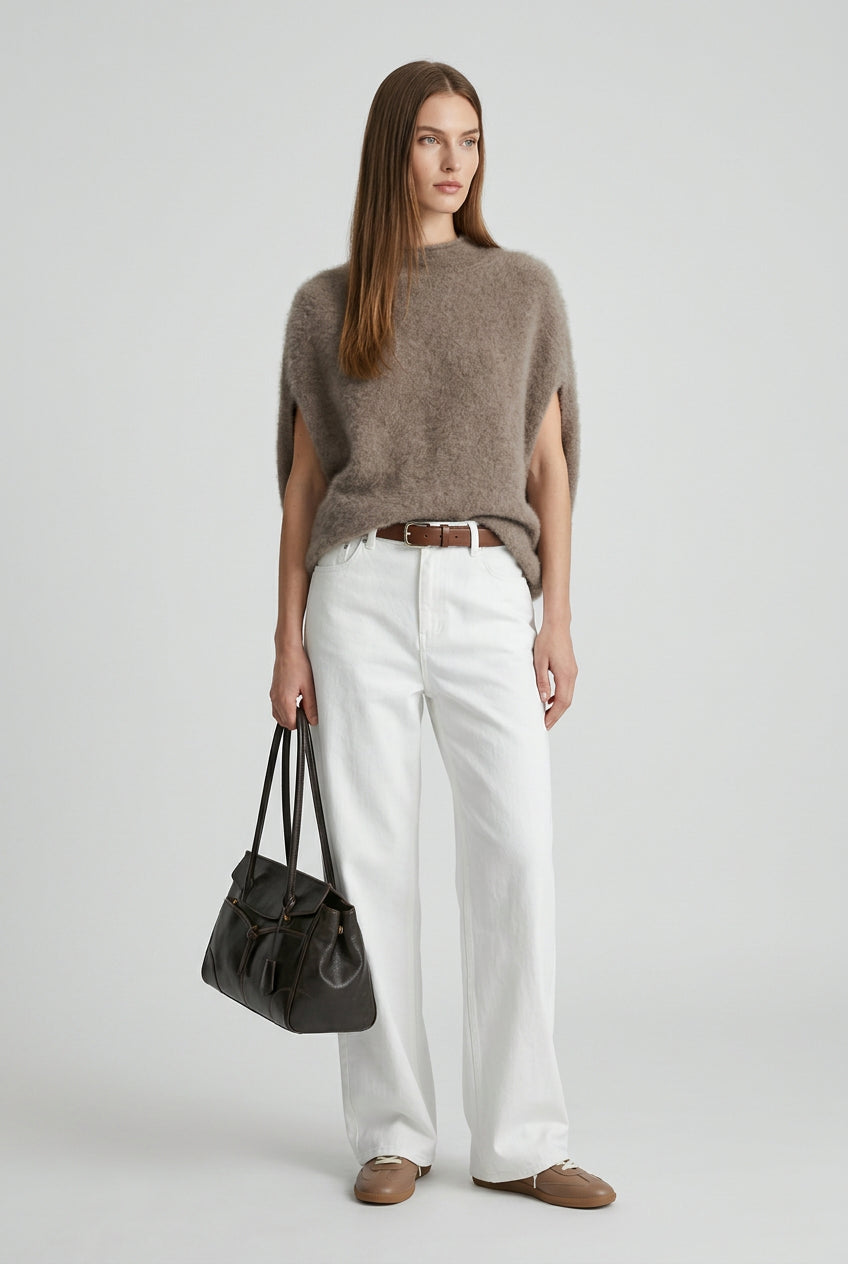 Women's sleeveless turtleneck knit vest in a relaxed, oversized-inspired silhouette