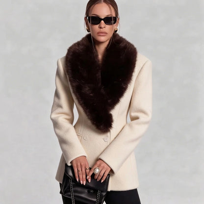 Beige tailored coat with a wide shawl collar and defined waist, front view