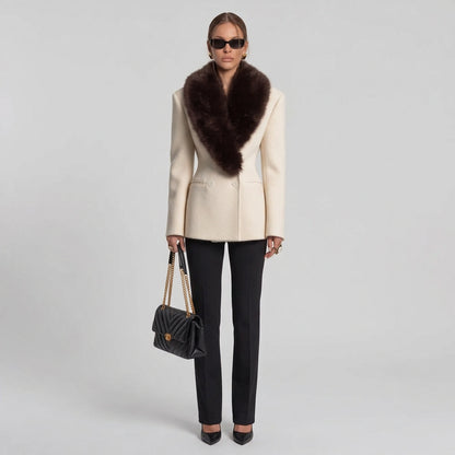 Beige shawl-collar coat shown from an alternate angle