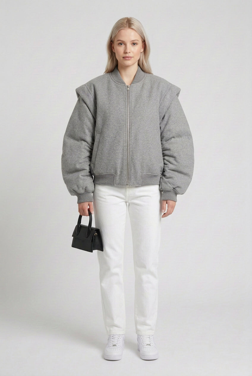 Gray double-zip jacket styled for a minimalist streetwear look
