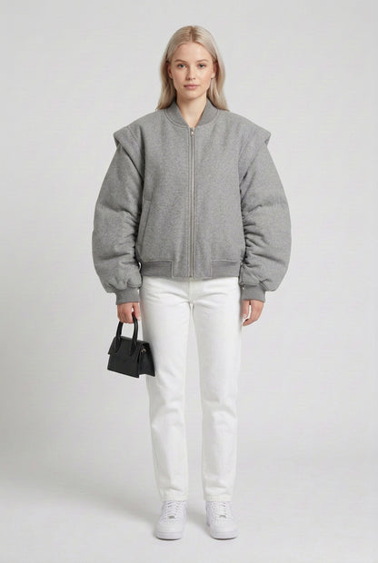 Gray double-zip jacket styled for a minimalist streetwear look