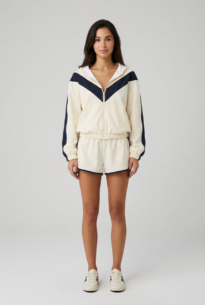 Women's contrast zip-up tracksuit set styled as a matching outfit