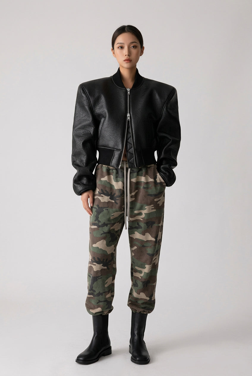 Gray double-zip jacket showing its collar and shoulder shape