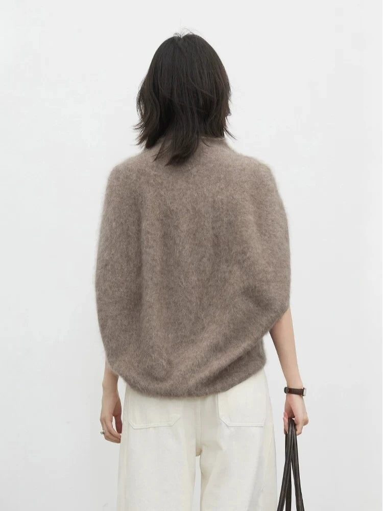 Relaxed silhouette of the Luxe Turtleneck Knit Vest for seasonal layering