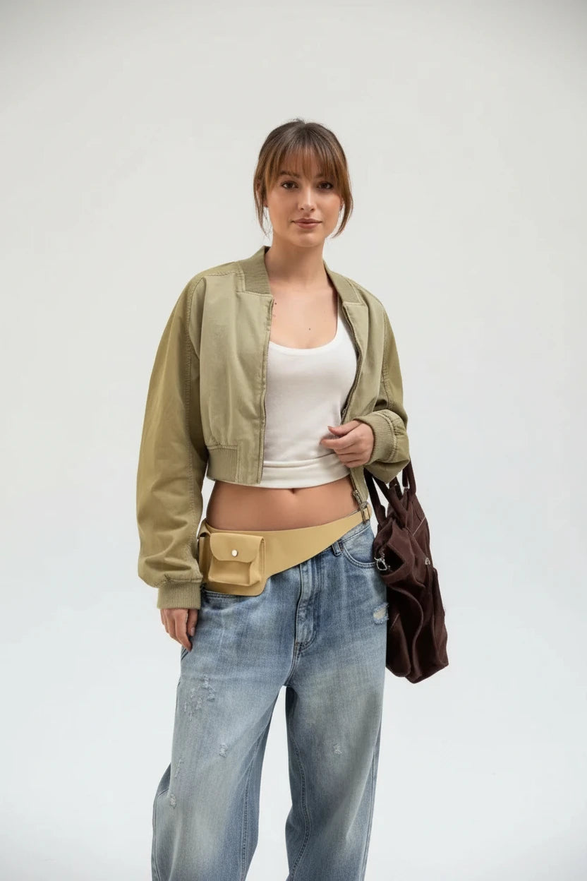 Woman wearing a cropped varsity bomber jacket
Front view of cropped women's bomber jacket
Woman styling a cropped bomber jacket with casual outfit
Close-up of zip front on cropped bomber jacket
Relaxed fit cropped varsity jacket for women
Side view of women's cropped bomber jacket
Full sleeve cropped bomber jacket
Woman wearing cropped jacket with high-waisted jeans