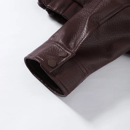 Side view showing the cropped jacket's shape and sleeve