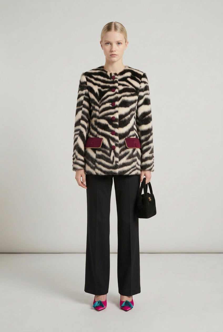 Zebra print faux fur coat with contrasting collar, front view