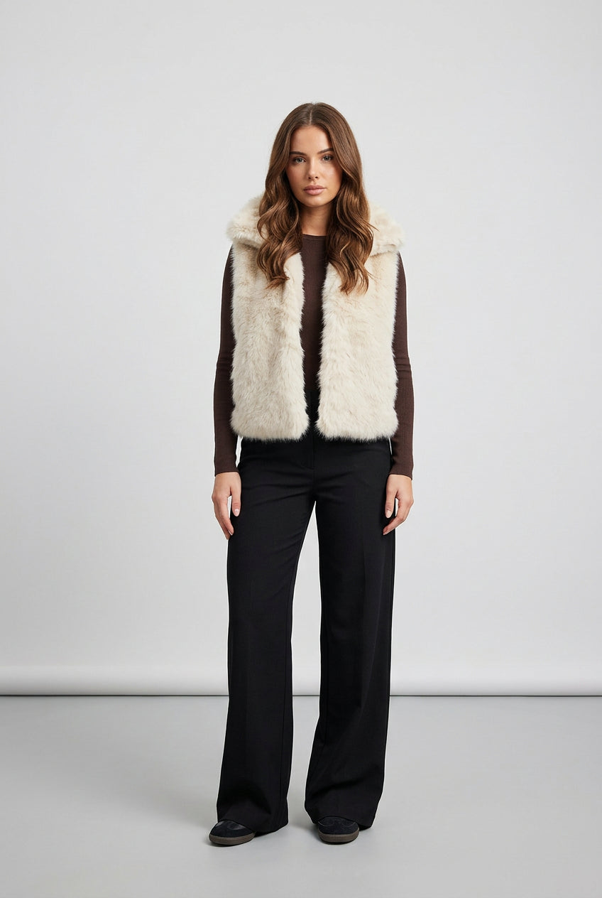 Women's sleeveless faux fur vest with a high neckline