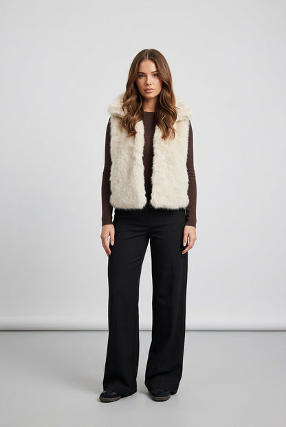 Women's sleeveless faux fur vest with a high neckline