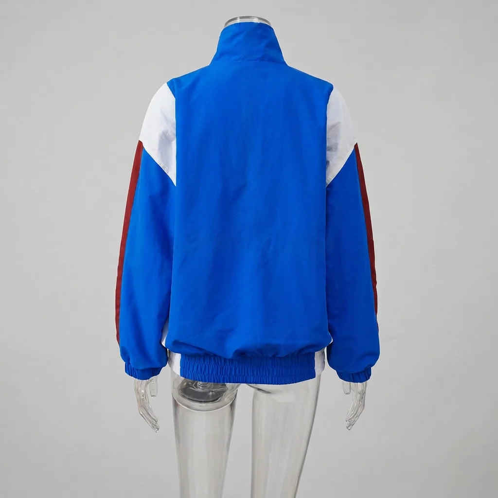 Sienna color-block tracksuit showing the coordinated jacket and pants
