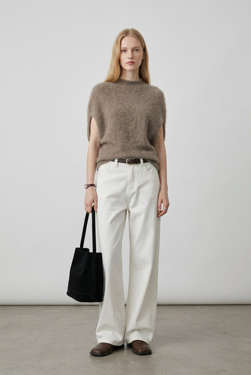 High neckline and knit texture detail on the Luxe Turtleneck Knit Vest