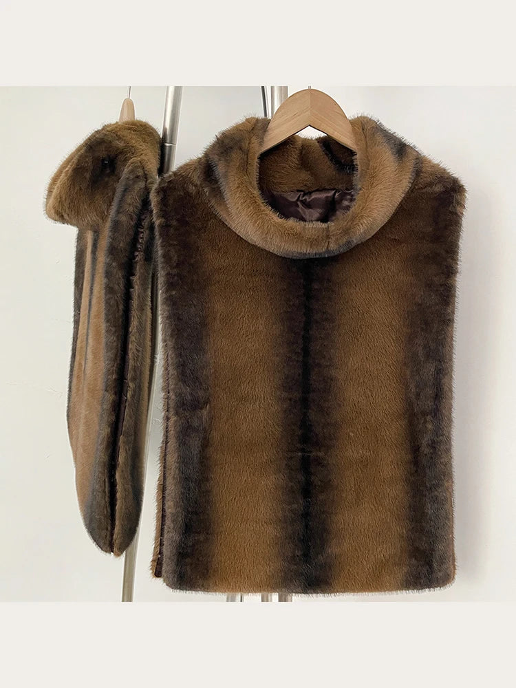 Women's faux fur vest in beige, front view

Women's plush faux fur vest with matching belt

Women's brown faux fur vest, sleeveless design

Women's faux fur vest with long front and short back

Close-up of plush faux fur vest texture

Women's faux fur vest styled with a long-sleeve top