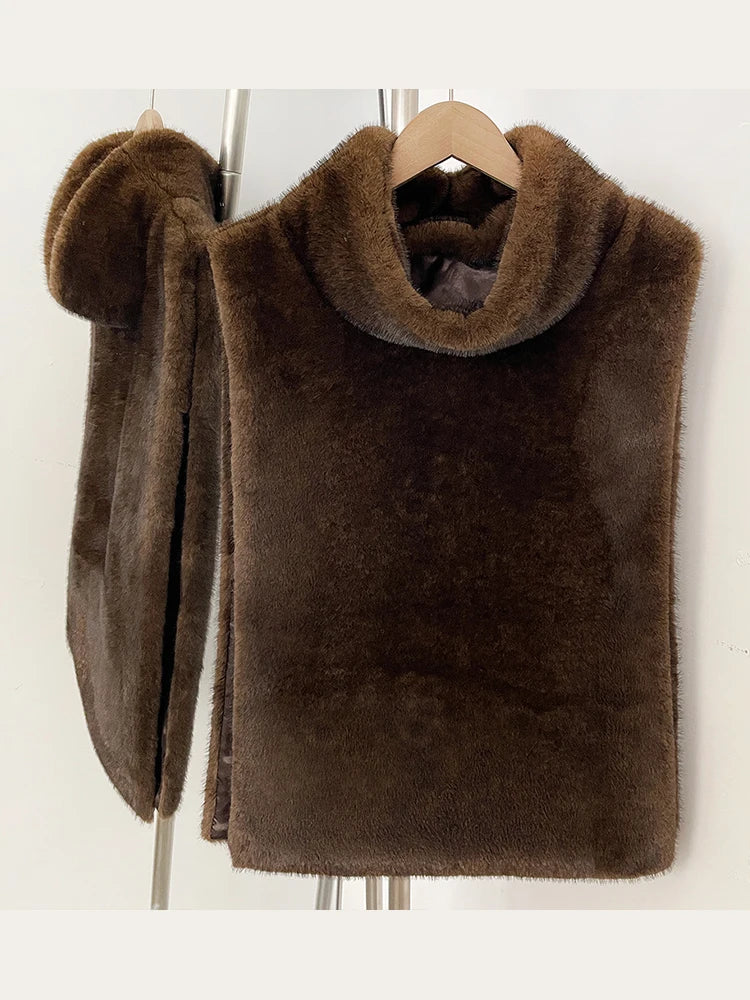 Women's faux fur vest in beige, front view

Women's plush faux fur vest with matching belt

Women's brown faux fur vest, sleeveless design

Women's faux fur vest with long front and short back

Close-up of plush faux fur vest texture

Women's faux fur vest styled with a long-sleeve top