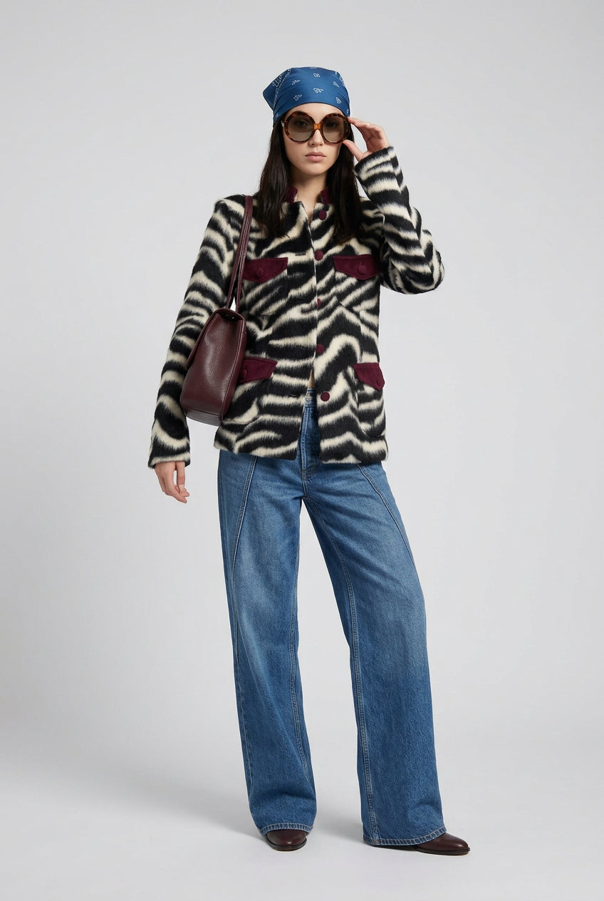 Zebra print faux fur coat styled for autumn outfits