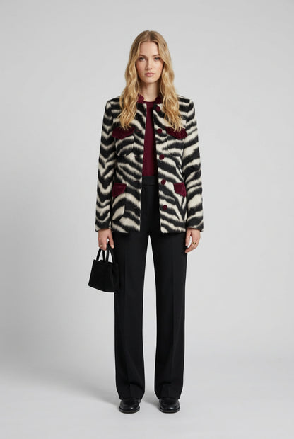 Zebra print coat showing the contrasting collar detail