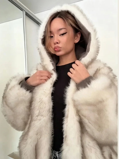 Close-up detail of the beige jacket hood and collar