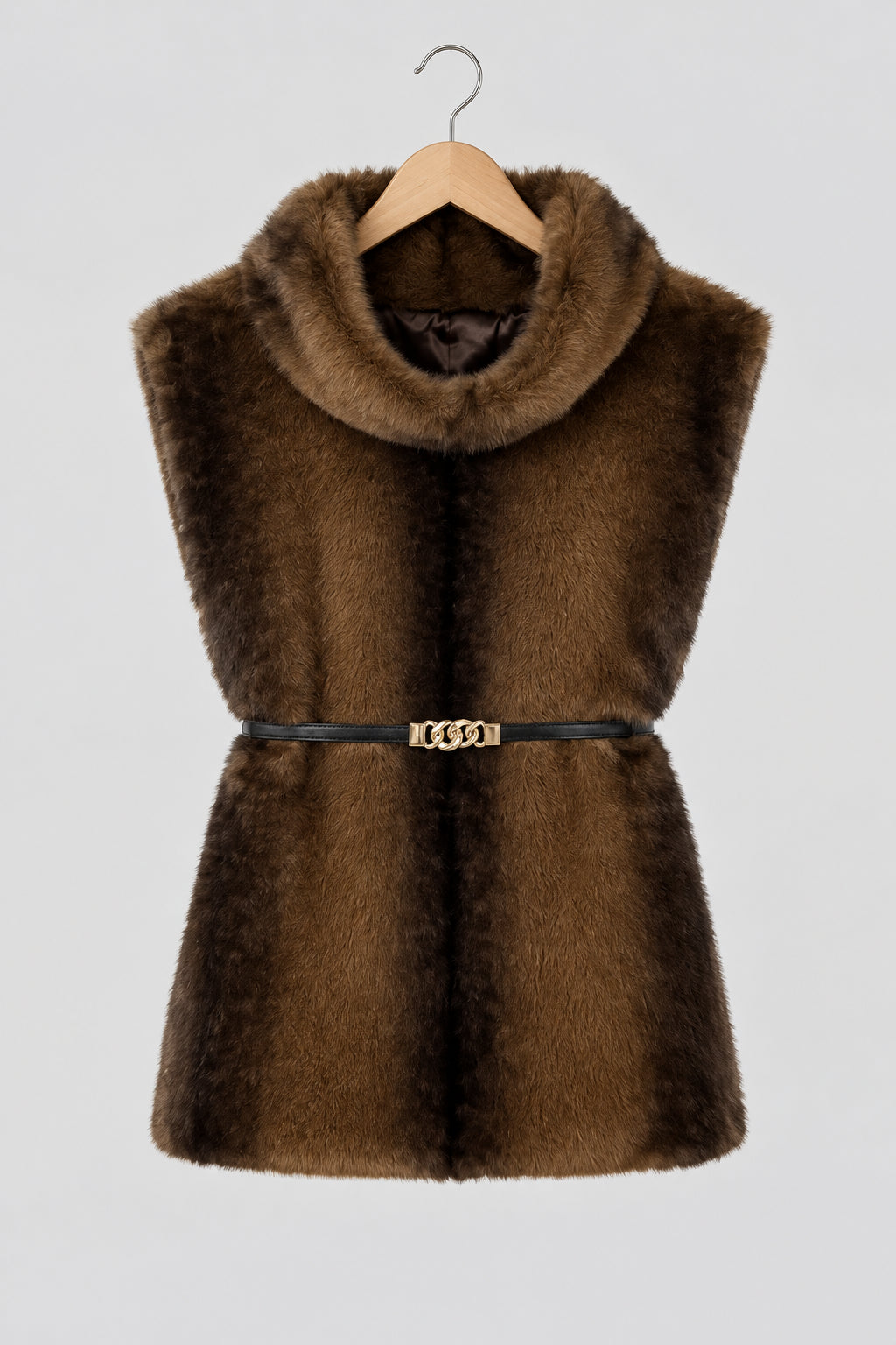 Women's faux fur vest in beige, front view

Women's plush faux fur vest with matching belt

Women's brown faux fur vest, sleeveless design

Women's faux fur vest with long front and short back

Close-up of plush faux fur vest texture

Women's faux fur vest styled with a long-sleeve top