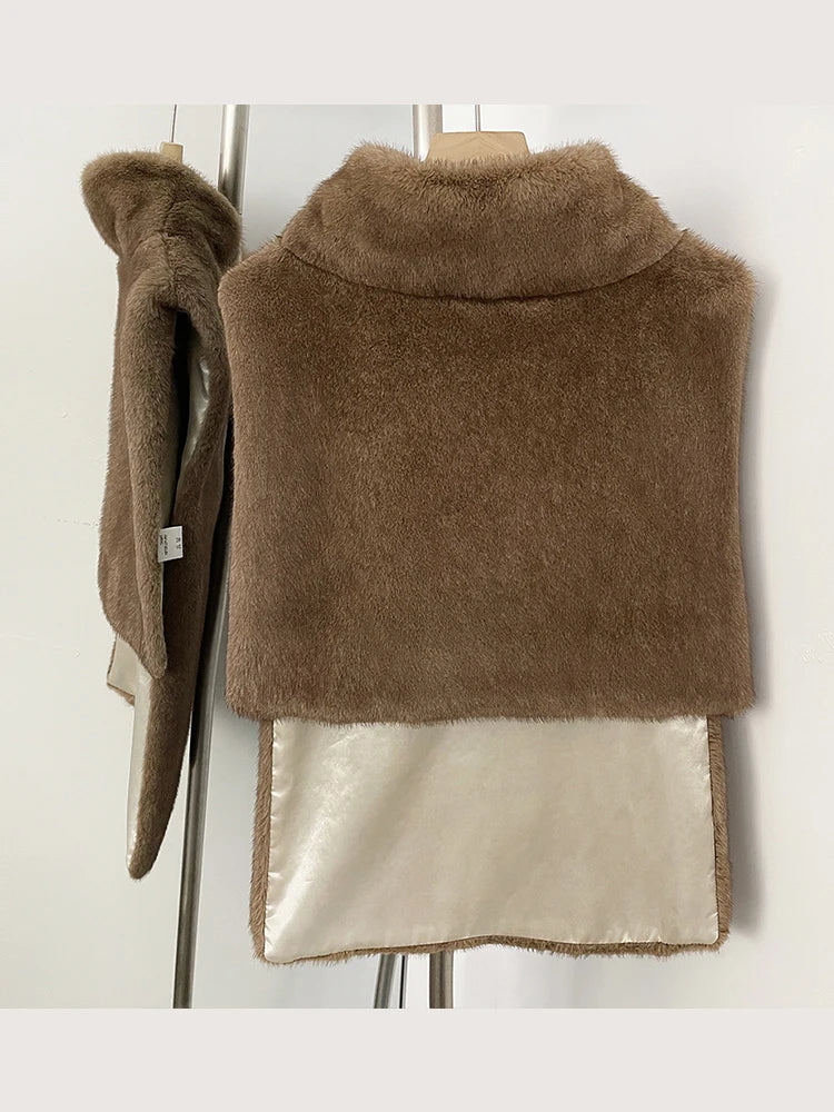 Women's faux fur vest in beige, front view

Women's plush faux fur vest with matching belt

Women's brown faux fur vest, sleeveless design

Women's faux fur vest with long front and short back

Close-up of plush faux fur vest texture

Women's faux fur vest styled with a long-sleeve top