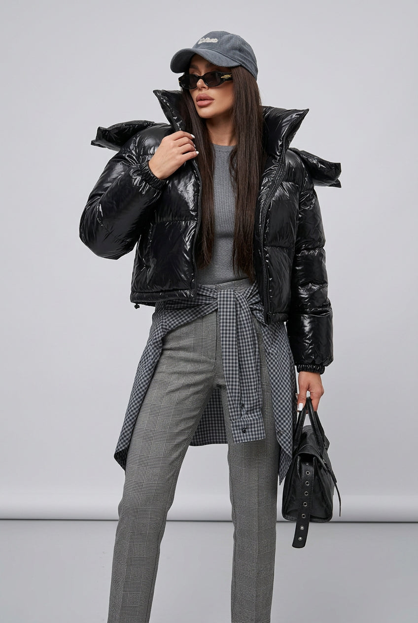 The Nova Puffer showing its hood and front zip closure