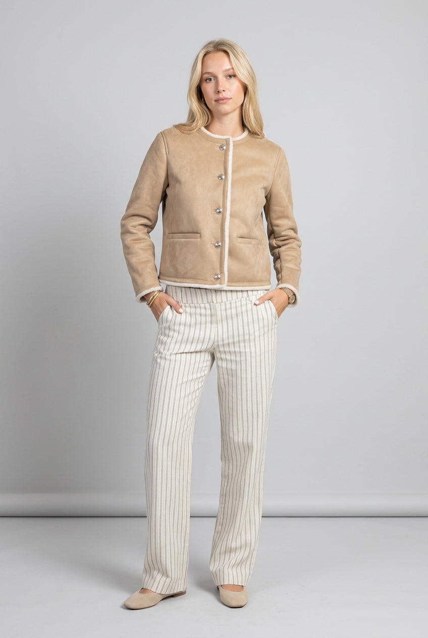 Khaki cropped jacket styled on a model