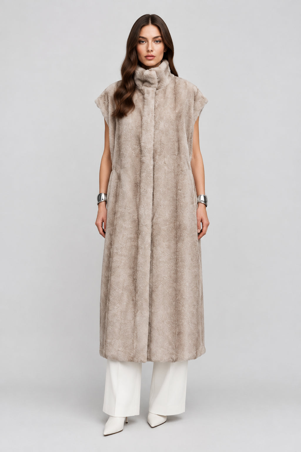 Women's longline faux fur vest with a defined waist