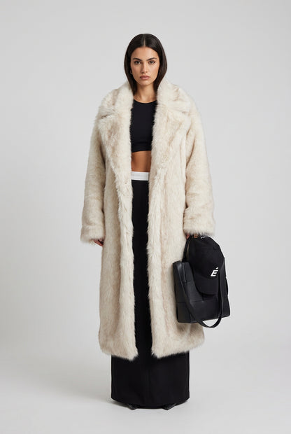 Detail of the faux fur coat collar and covered buttons