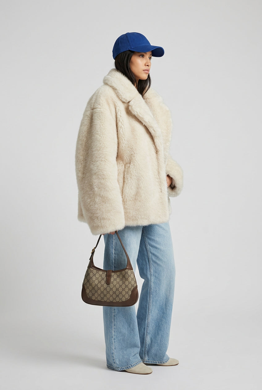 Creamy-white gradient faux fur coat with a wide turn-down collar